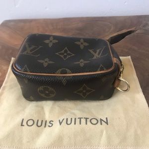 Authentic Louis Vuitton wristlet. Missing strap.